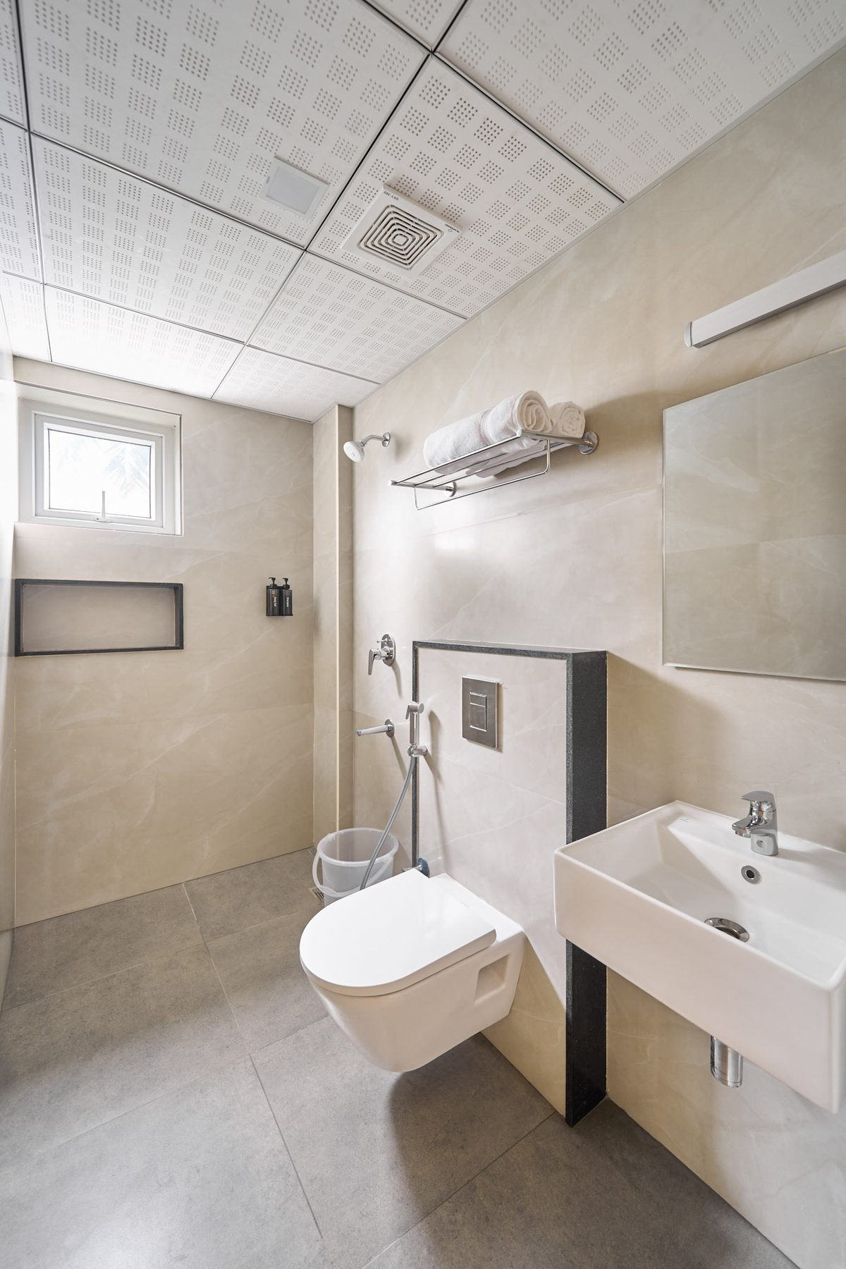 Clean bathroom with complimentary body wash and shampoo