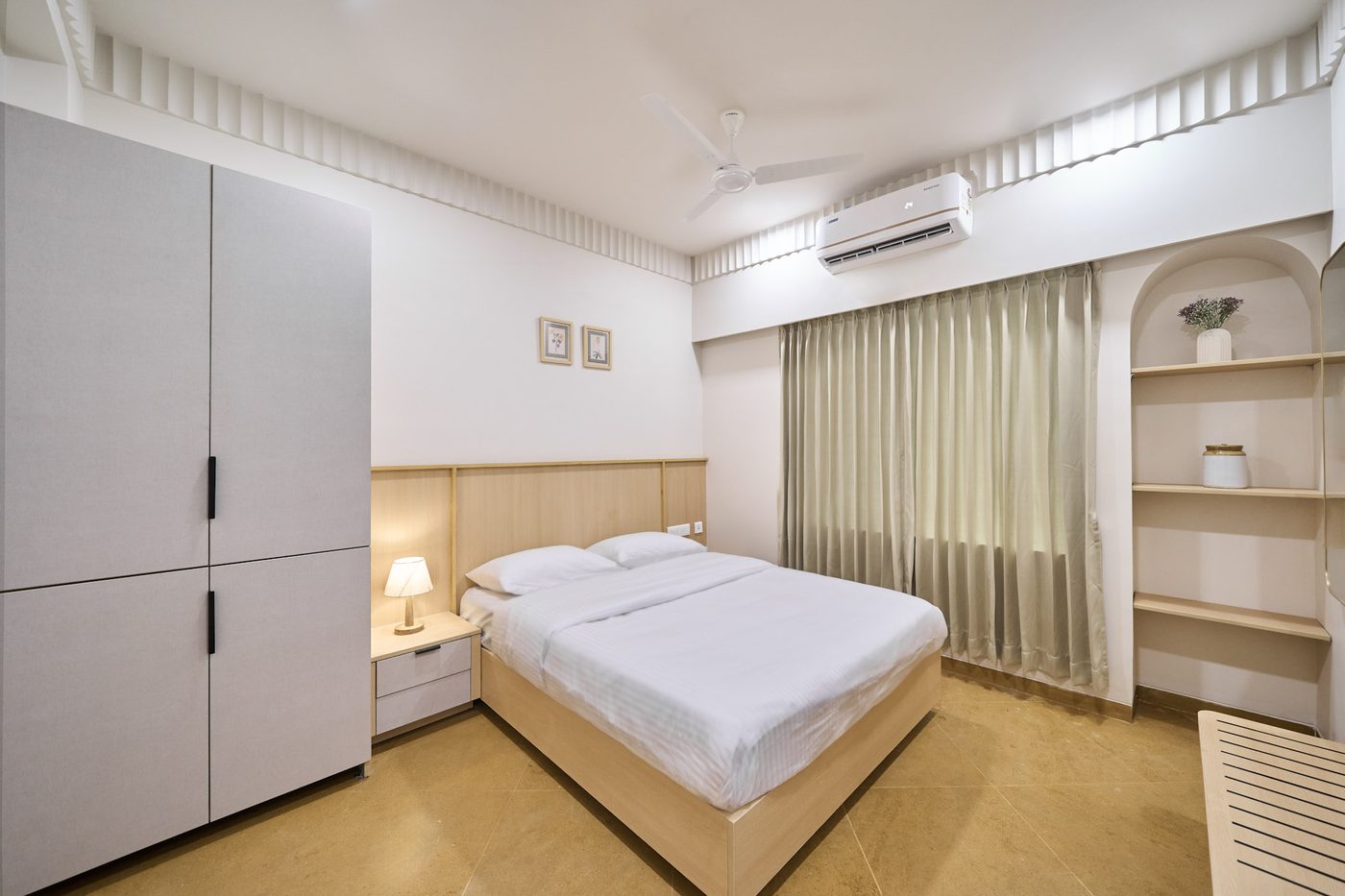 Air-conditioned bedroom at Parthas Suites